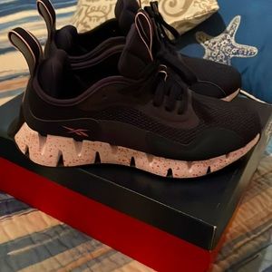 Like new Reebok womens Zig Dynamic size 7 navy, white, pink